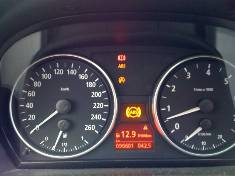 Abs brake and traction control light on bmw