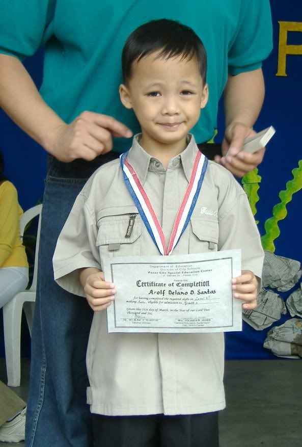 Dale with his Certificate and Gold Medal