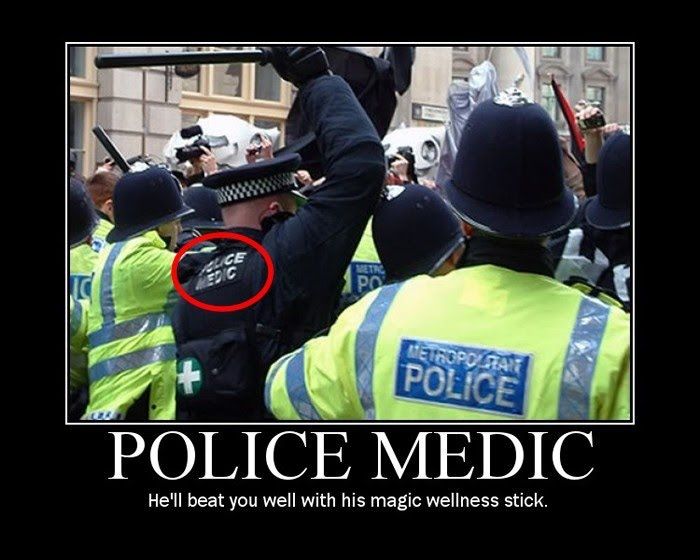 PoliceMedic-HellBeatYouWellWithHisMagicWellnessStick.jpg