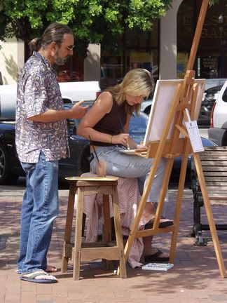 Genna Elkin painting Cpt. Wayne-O advising