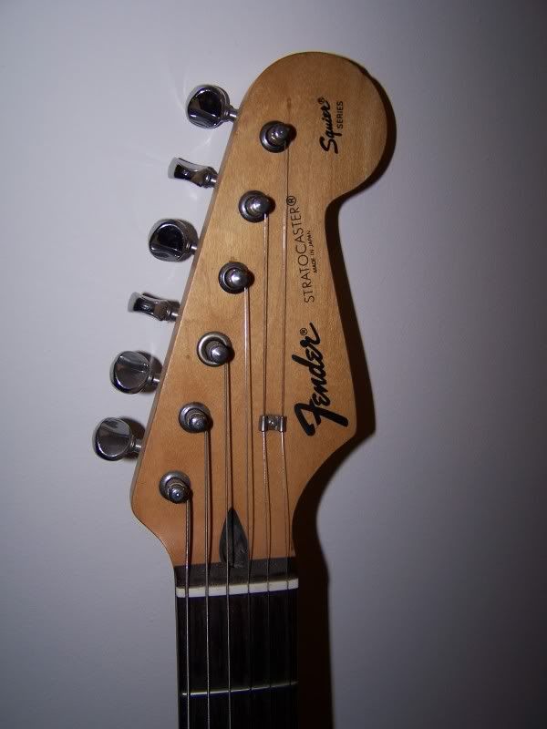 FENDER BLACK LOGO (SQUIER SERIES) CAN ANYONE HELO WITH INFO PLEASE