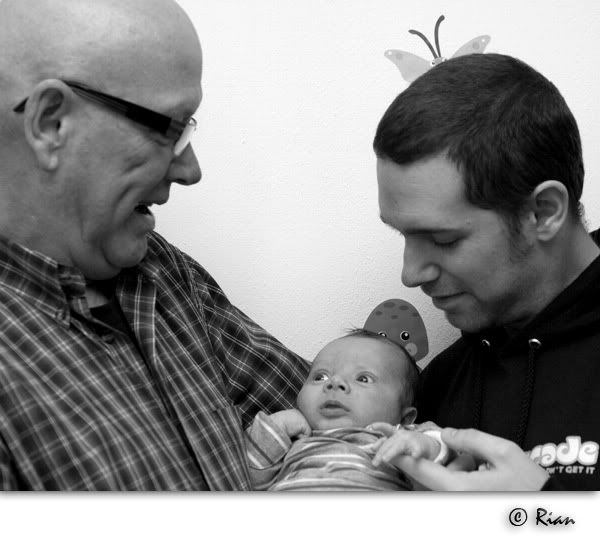 Two men and a baby