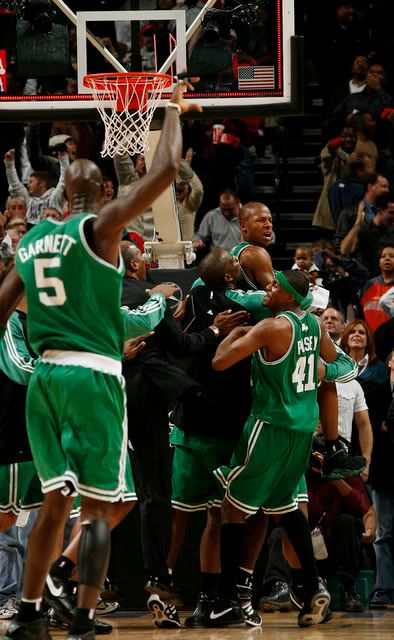 Ray was mobbed his teammates after hitting the game winner at the buzzer