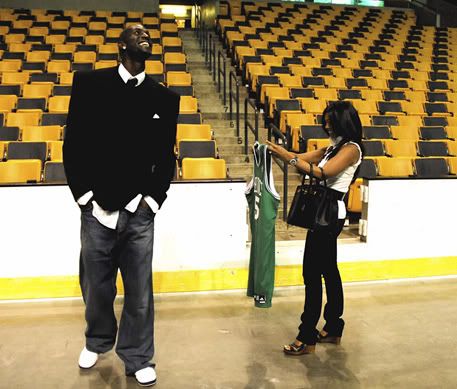 KG and Brandi stroll through Boston Garden. Brandi seems to love Kevin's jersey.